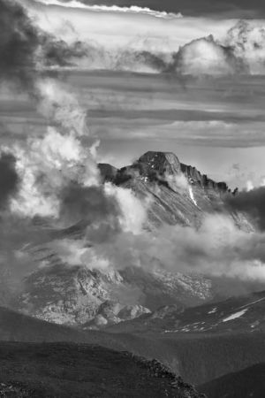 Longs Enshrouded. Black and white landscape photograph of Longs Peak enshrouded in clouds of afternoons thunderstorms taken from alpine tundra of Rocky Mountain National Park Colorado. Black and white landscape photograph of Longs Peak enshrouded in clouds of afternoons thunderstorms taken from alpine tundra of Rocky Mountain National Park Colorado
