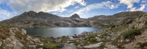 Blue View. . Panoramic landscape photograph 270 degrees of Blue Lake nestled in alpine tundra of the Mount Toll cirque of the Indian Peaks Wilderness Rocky Mountains Colorado. Panoramic landscape photograph 270 degrees of Blue Lake nestled in alpine tundra of the Mount Toll cirque of the Indian Peaks Wilderness Rocky Mountains Colorado